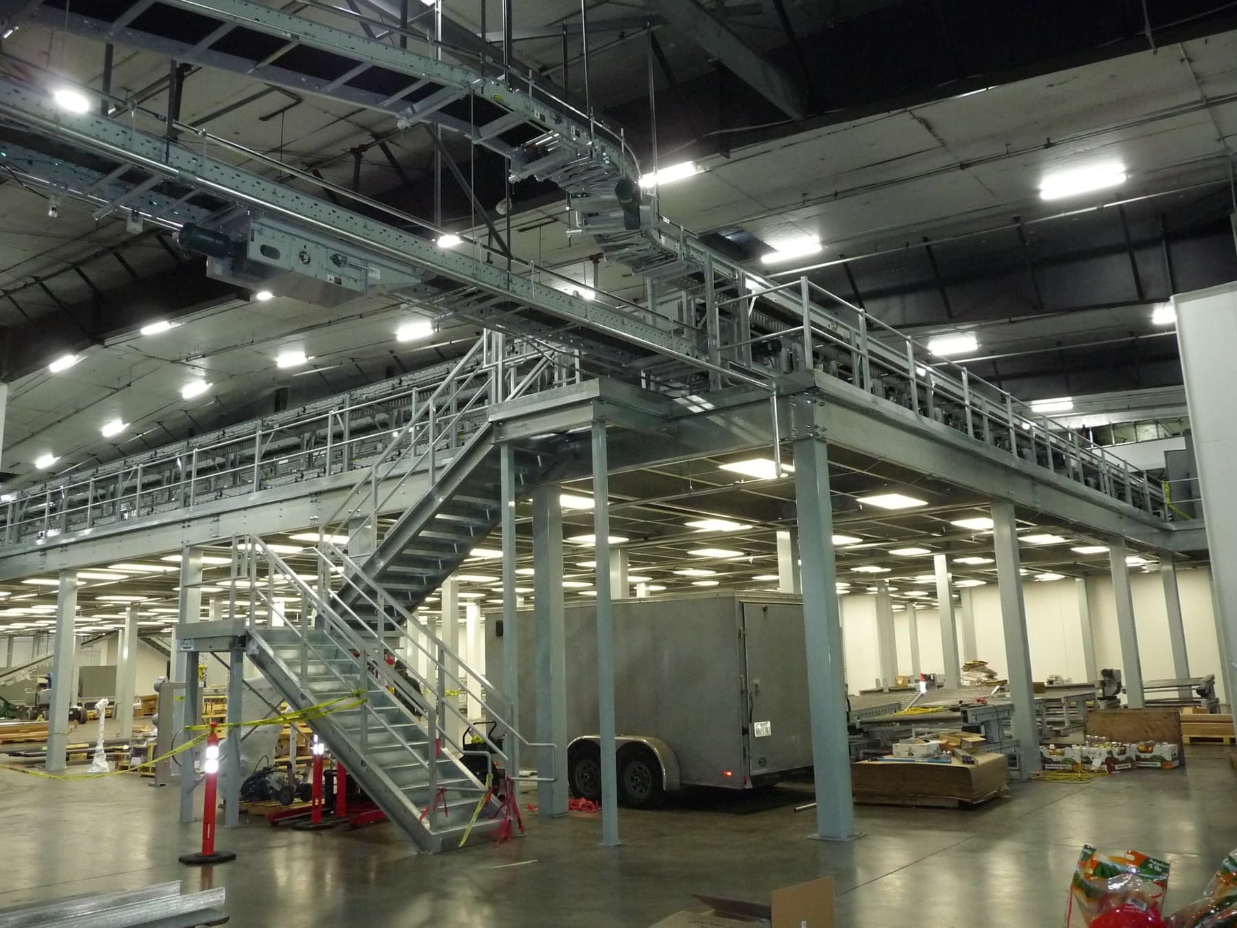 Custom warehouse mezzanine with staircase and railing
